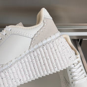 CHLOÉ 26S WEDGE SNEAKERS 70 MM IN WHITE CALFSKIN