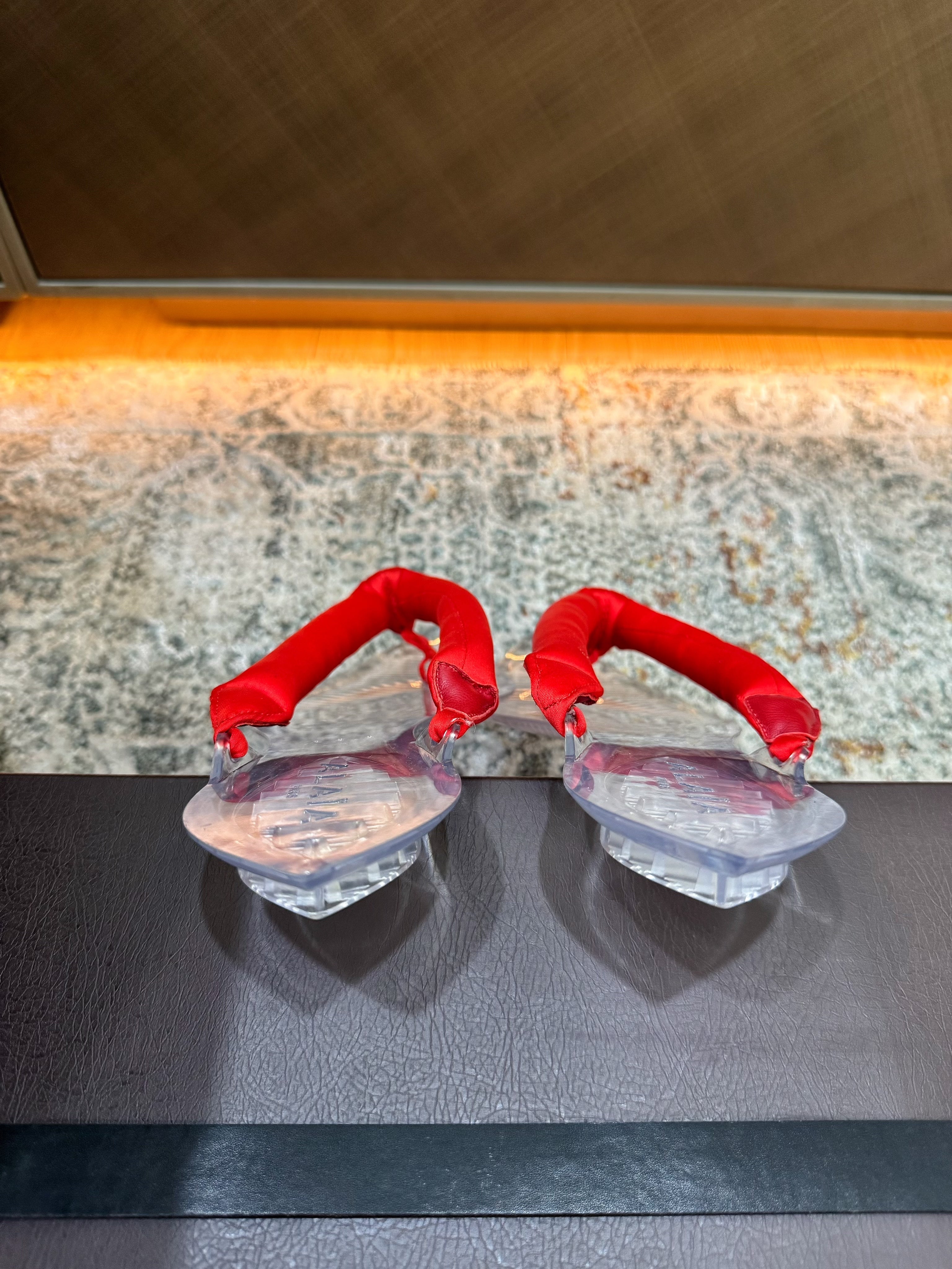 ALAIA 26S THONG SANDALS IN RED SATIN AND TRANSPARENT PVC