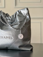CHANEL 26S 22 BAG 42 IN METALLIC SILVER QUILTED SHINY CALFSKIN