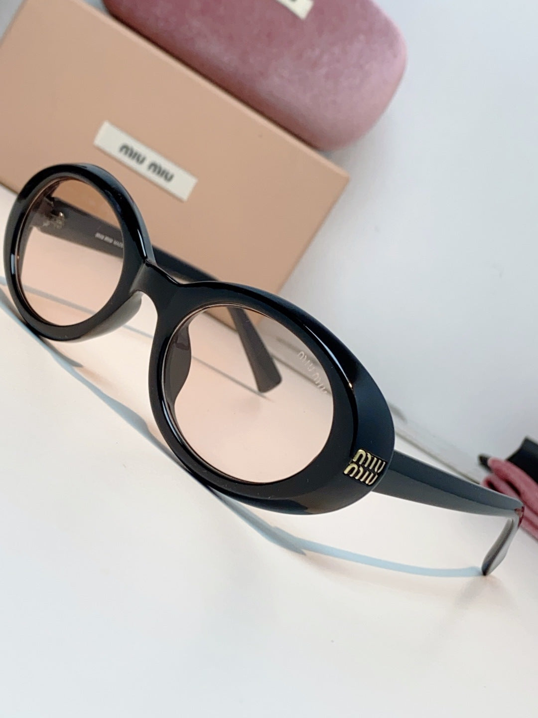 MIUMIU 26S OVAL FRAME IN ACETATE 424530