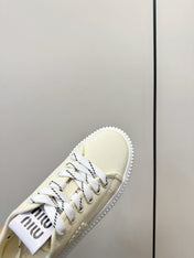 MIUMIU 26S PLATFORM SNEAKERS IN LIGHT YELLOW CANVAS