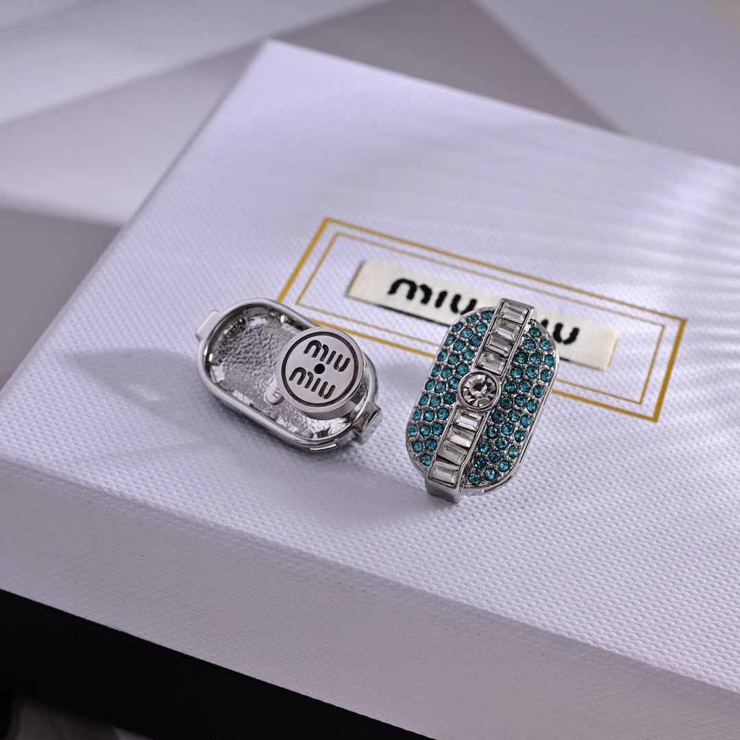 MIUMIU 26S CRYSTAL OVAL STUD EARRINGS IN TURQUOISE AND CLEAR STONES IN SILVER TONE METAL 626875