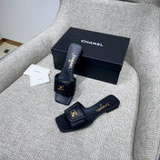 CHANEL 26S FLAT SLIDES IN BLACK LAMBSKIN