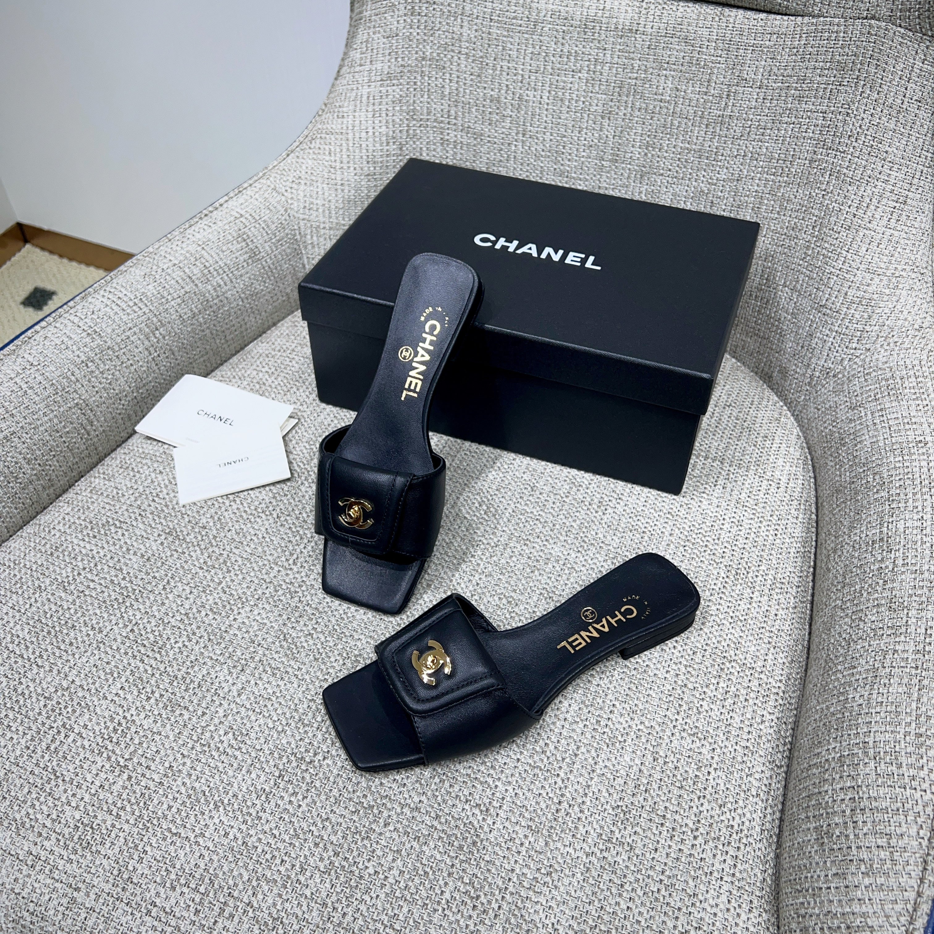 CHANEL 26S FLAT SLIDES IN BLACK LAMBSKIN