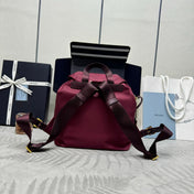 PRADA 25S RE-EDITION 1978 SMALL BACKPACK 28 IN BURGUNDY RE-NYLON