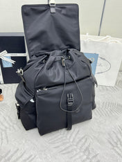 PRADA 25S EXPLORE BACKPACK 39 IN BLACK RE-NYLON AND CALFSKIN