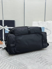 PRADA 25S EXPLORE BACKPACK 39 IN BLACK RE-NYLON AND CALFSKIN