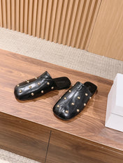 CHLOE 26S STUDDED FLAT MULES IN BLACK CALFSKIN
