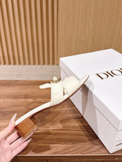 DIOR 26S LOW HEEL SLIDE SANDALS IN WHITE CALFSKIN GOLD PEARL BUCKLE