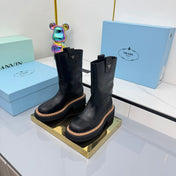 PRADA 25S HIGH MARTIN BOOTS 50MM IN BLACK CALFSKIN