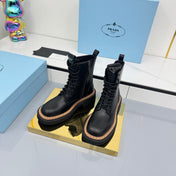 PRADA 25S LONG THICK SOLED MARTIN BOOTS 50MM IN BLACK CALFSKIN