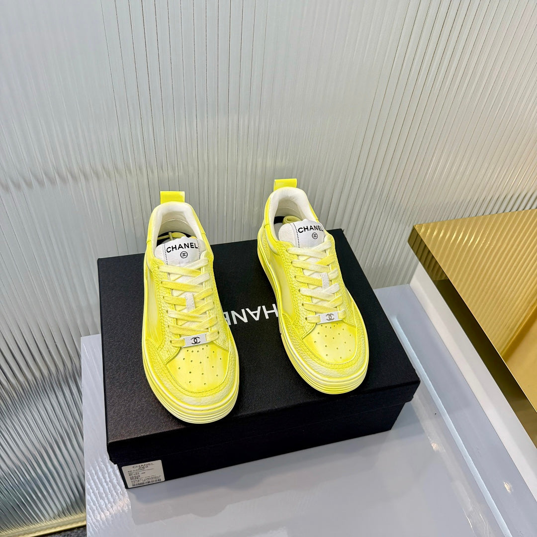 CHANEL 26S LOW-TOP SNEAKERS IN LIGHT YELLOW CALFSKIN