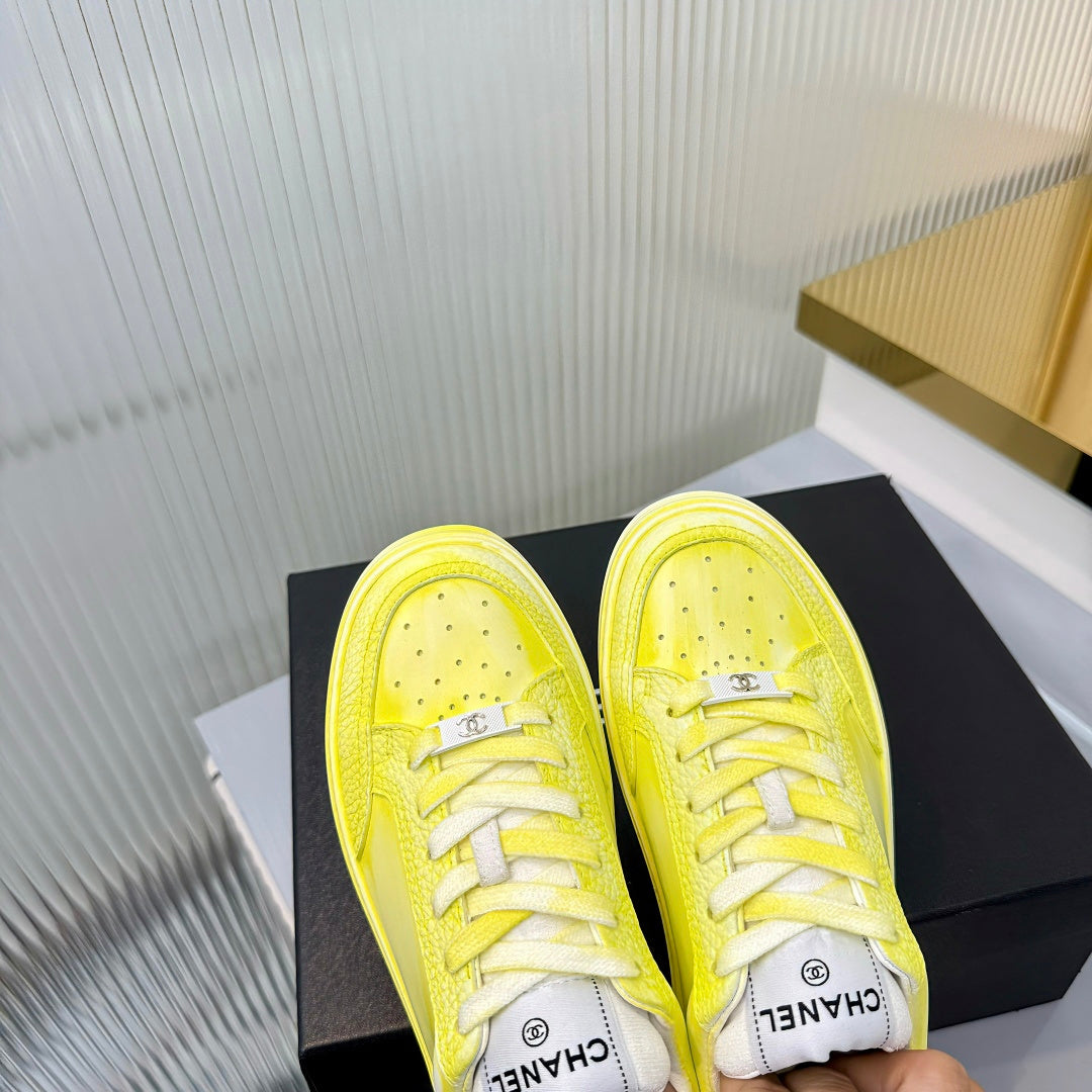 CHANEL 26S LOW-TOP SNEAKERS IN LIGHT YELLOW CALFSKIN