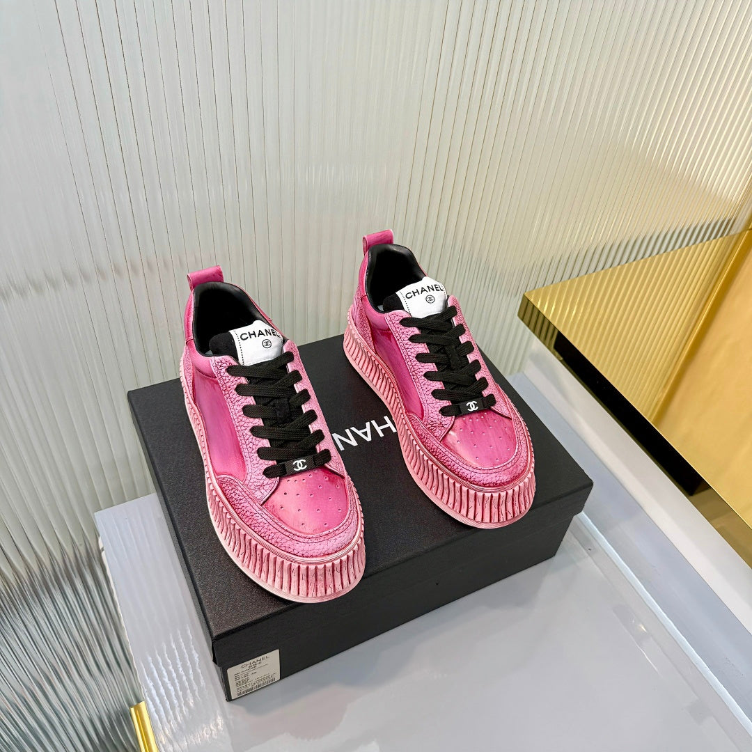 CHANEL 26S LOW-TOP SNEAKERS IN DARK PINK GRAFFITI PATTERN CALFSKIN