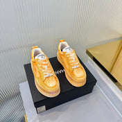 CHANEL 26S LOW-TOP SNEAKERS IN GOLDEN ORANGE GRAFFITI PATTERN CALFSKIN