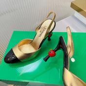 CHANEL 26S SLINGBACK POINTED-TOE HEELS 95 MM IN GOLD LAMBSKIN WITH BLACK CAP TOE