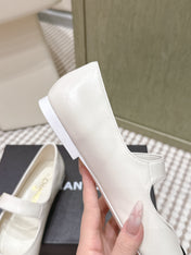 CHANEL 25S MARY JANE FLAT IN WHITE LAMBSKIN WITH BLACK VELVET CAP TOE