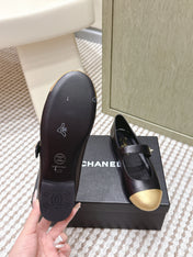 CHANEL 25S MARY JANE FLAT IN BLACK LAMBSKIN WITH YELLOW CAP TOE GOLD HARDWARE