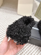 CHANEL 25S CLASSIC FURRY SLIDES IN BLACK WITH DOUBLE C LOGO