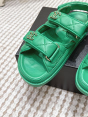 CHANEL 26S QUILTED DAD SANDALS IN GREEN CALFSKIN
