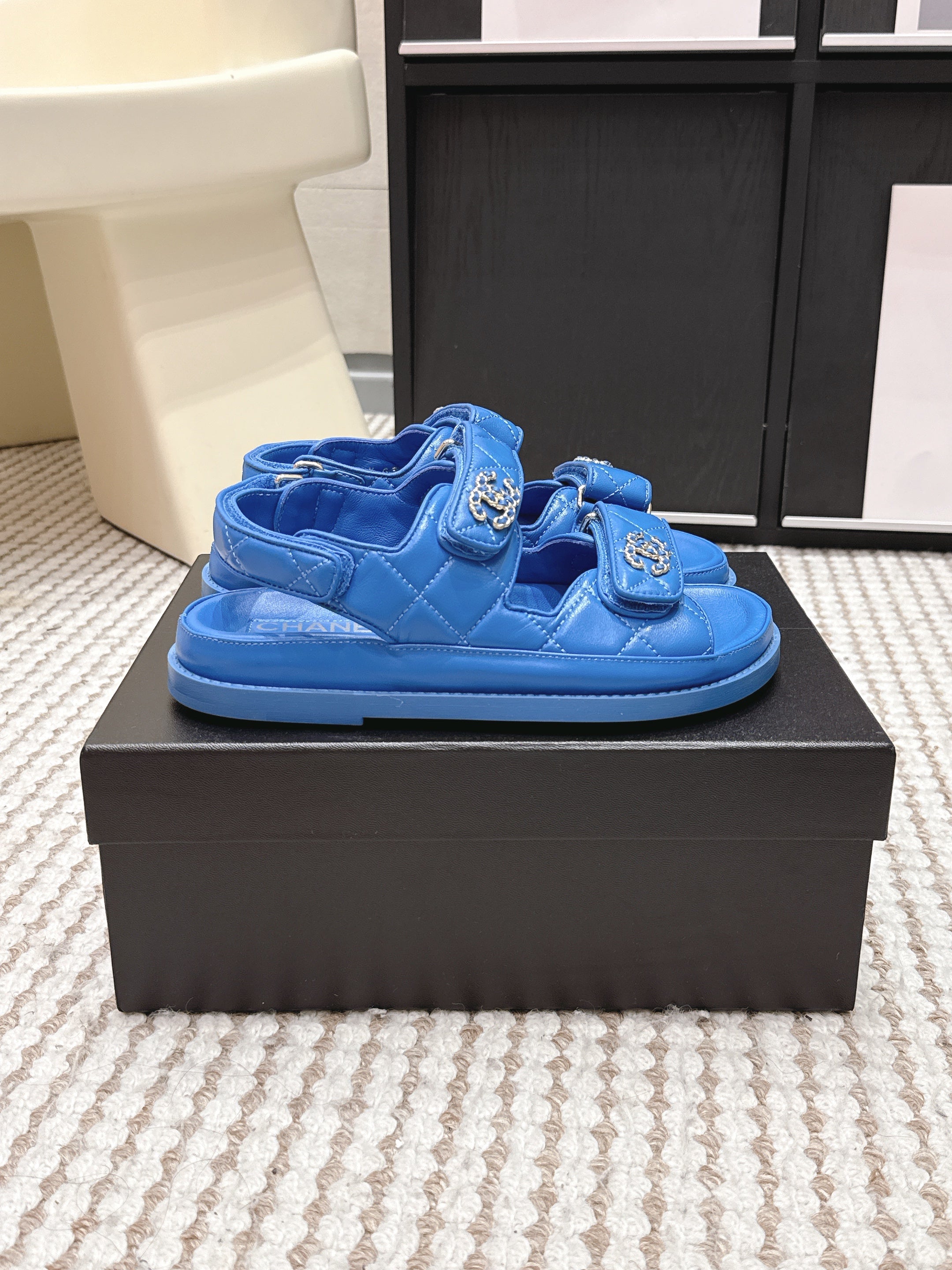 CHANEL 26S QUILTED DAD SANDALS IN BLUE CALFSKIN