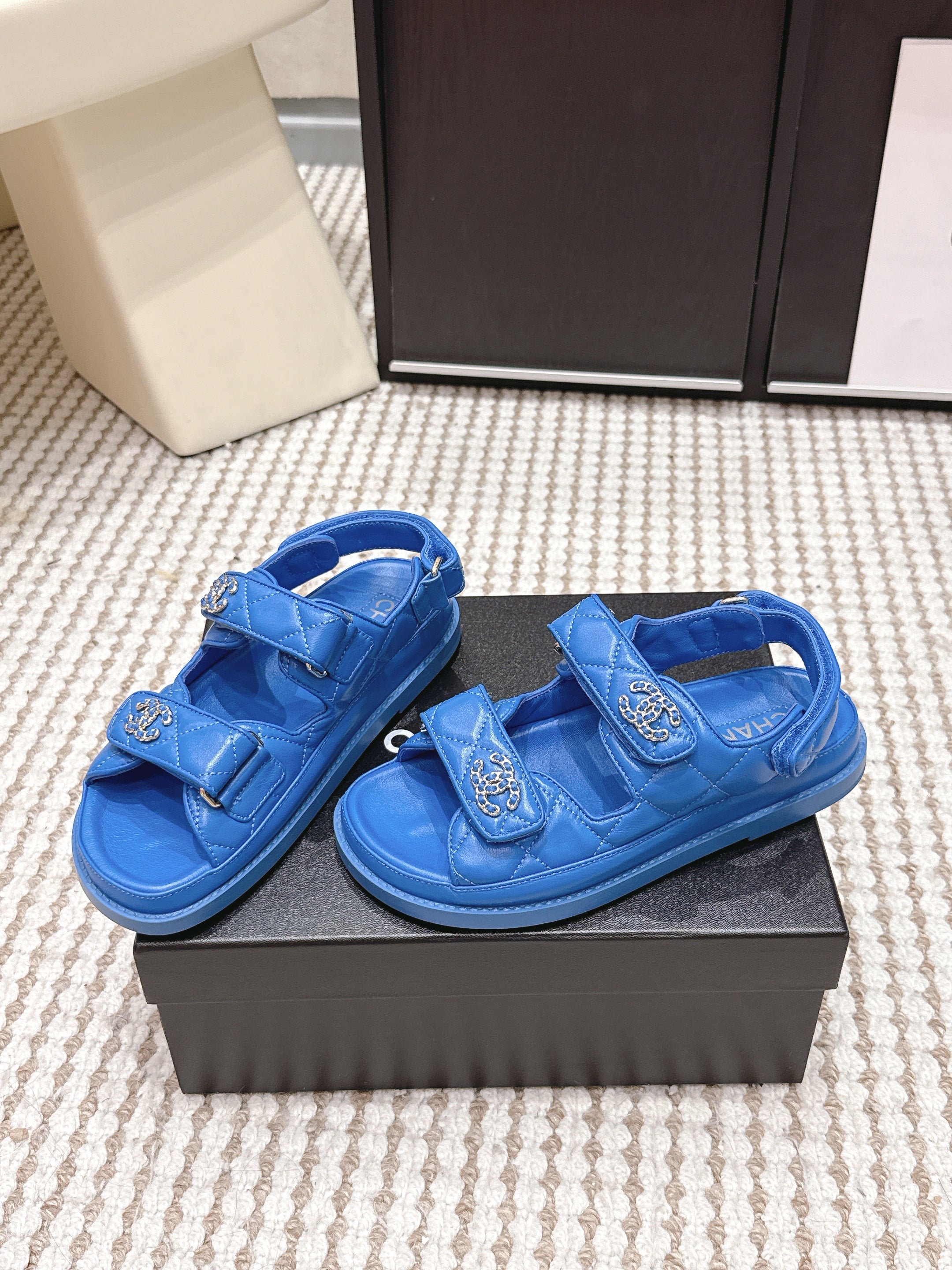 CHANEL 26S QUILTED DAD SANDALS IN BLUE CALFSKIN