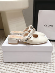 DIOR 26S CLOSED-TOE LOW-HEEL MULE IN IVORY WHITE CALFSKIN WITH BOW