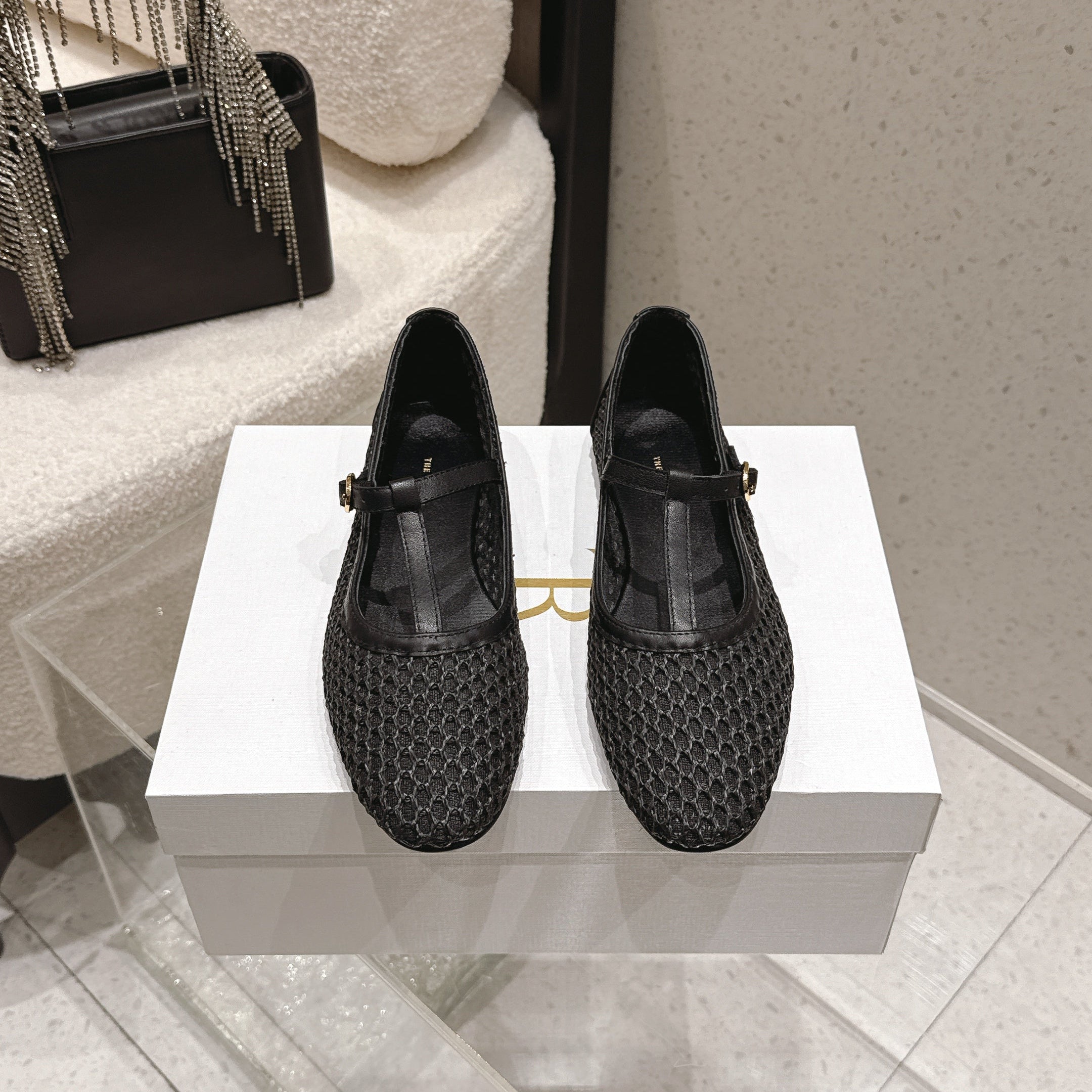 THE ROW 26S MARY JANE FLATS IN BLACK CALFSKIN AND MESH