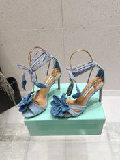 AQUAZZURA 26S FLORAL HEELS 100 MM IN PASTEL BLUE WOVEN RAFFIA AND FABRIC