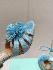 AQUAZZURA 26S HIGH-HEEL SANDALS 100 MM IN LIGHT BLUE WOVEN RAFFIA