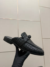 BOTTEGA VENETA 26S BACKLESS LOAFERS IN BLACK TECHNICAL WOVEN CALFSKIN STYLE 2