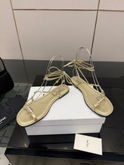 CELINE 26S TRIOMPHE LACE UP FLAT SANDALS IN GOLD CALFSKIN