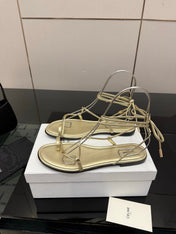 CELINE 26S TRIOMPHE LACE UP FLAT SANDALS IN GOLD CALFSKIN