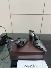 ALAIA 26S HEELED SLINGBACKS IN BLACK PYTHON-EMBOSSED LEATHER