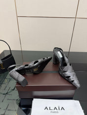 ALAIA 26S HEELED SLINGBACKS IN BLACK PYTHON-EMBOSSED LEATHER
