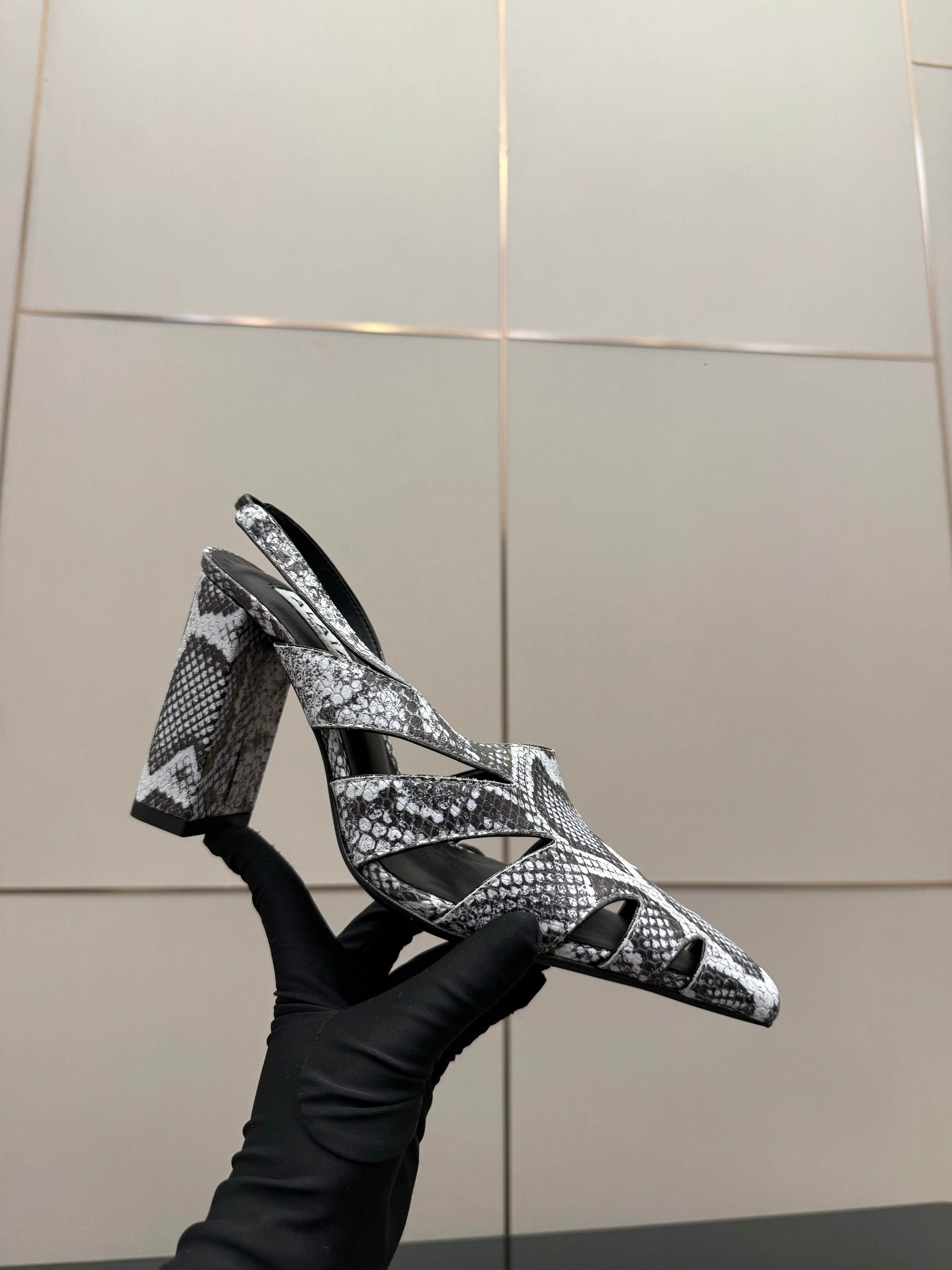 ALAIA 26S HEELED SLINGBACKS IN PYTHON-EMBOSSED LEATHER