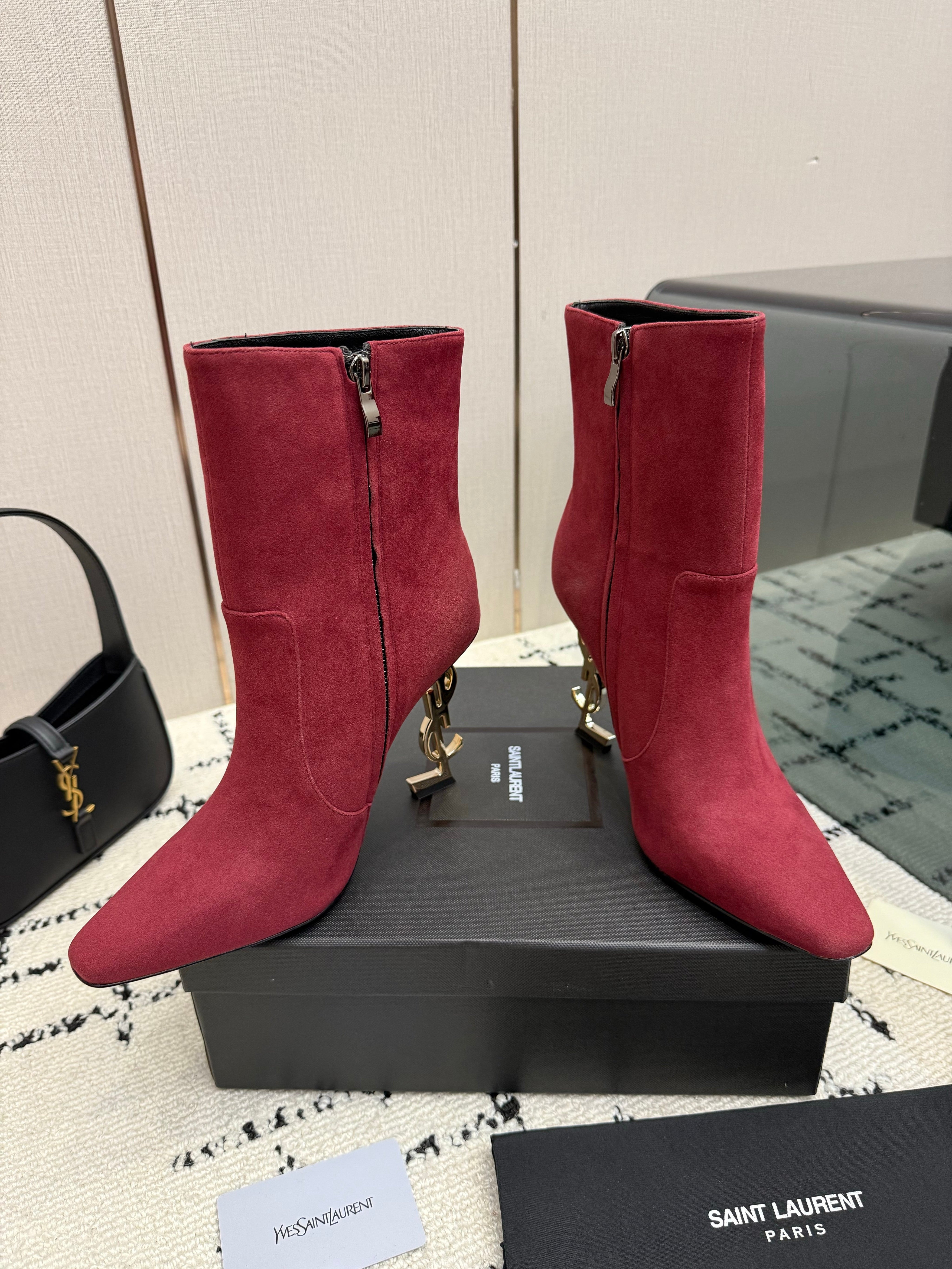 YSL 26S YSL LOGO HEEL ANKLE BOOTS 100 MM IN RED SUEDE