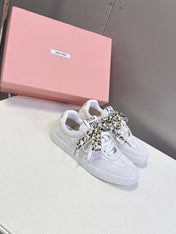 MIUMIU 25S SNEAKERS IN WHITE SUEDE WITH LEOPARD-PRINT LACES