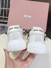 MIUMIU 25S SNEAKERS 45NN IN WHITE SUEDE WITH LEOPARD-PRINT LACES