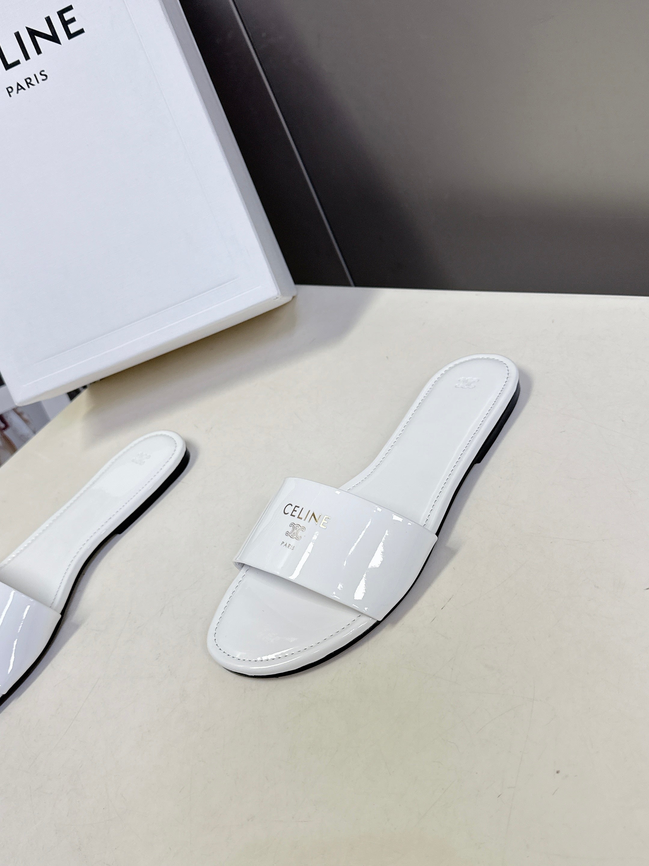 CELINE 26S FLAT SLIDES IN WHITE PATENT LAMBSKIN