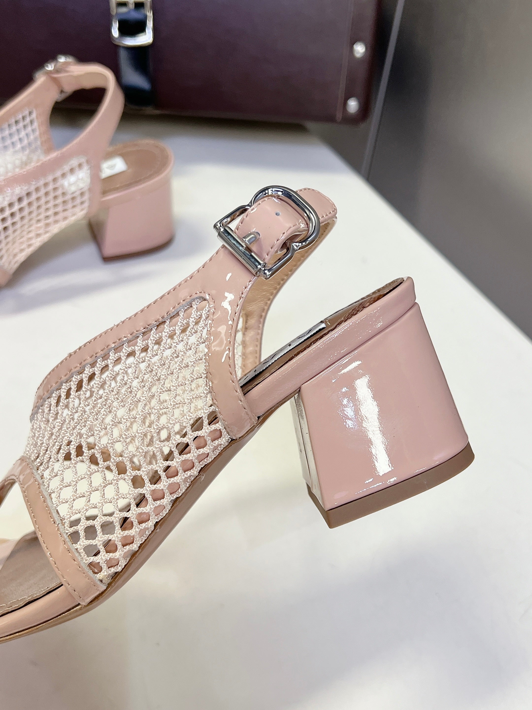 ALAIA 26S MESH THONG HEELS 55 MM IN PALE PINK PATENT CALFSKIN