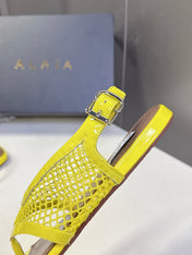 ALAIA 26S FLAT MESH THONG SANDALS IN YELLOW PATENT CALFSKIN