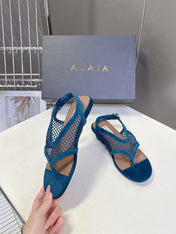 ALAIA 26S FLAT MESH THONG SANDALS IN PETROL BLUE SUEDE