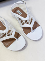 ALAIA 26S FLAT MESH THONG SANDALS IN WHITE PATENT CALFSKIN