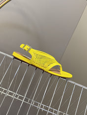 ALAIA 26S FLAT MESH THONG SANDALS IN YELLOW PATENT CALFSKIN