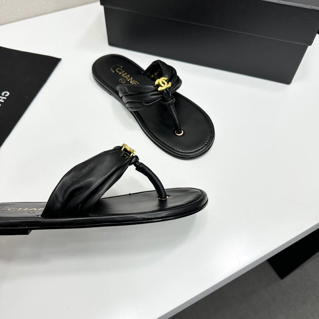 CHANEL 26S THONG SANDALS IN BLACK LAMBSKIN