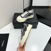 CHANEL 26S PLATFORM SNEAKERS IN GREY CHECKERED WOVEN DENIM FABRIC