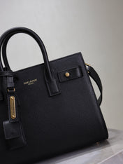 YSL 25S SAC DE JOUR 22 IN BLACK SUPPLE GRAINED CALFSKIN GOLD HARDWARE