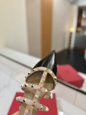 VALENTINO 26S STUDDED FLAT MULES IN BLACK PATENT CALFSKIN