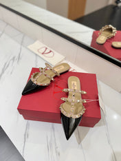 VALENTINO 26S STUDDED FLAT MULES IN BLACK PATENT CALFSKIN